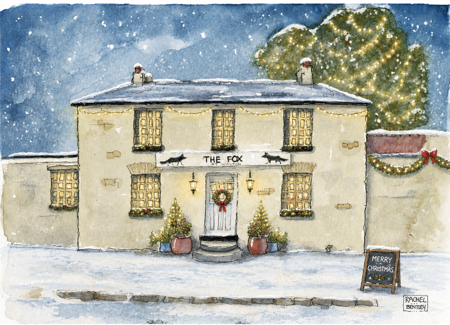 Watercolour painting by Rachel Bentley of The Fox at Walton in the snow — wreath on the door, fairy lights across the front, decorated Christmas trees flanking the entrance